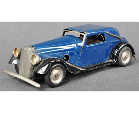 An original vintage Tri-ang Minic Toys made tinplate clockwork saloon model car in blue and black. Working order, no key. Mea