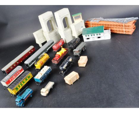 A collection of assorted 00 gauge model railway trainset locomotive rolling stock wagons, carriages and accessories. The coll