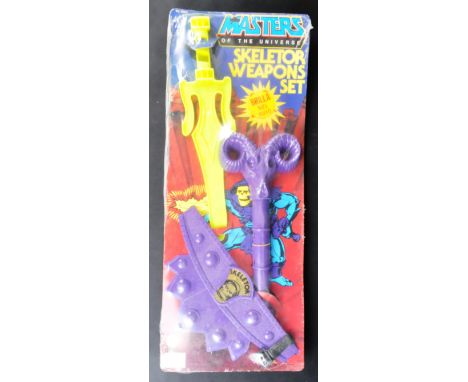 Masters Of The Universe - A 1980's HG Toys under license from Mattel made ' Skeletor Weapons Set ' with 'Glo-In-Dark' feature