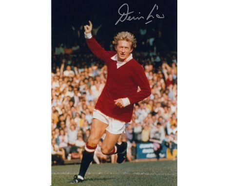 Autographed DENIS LAW 12 x 8 photo : Col, depicting a wonderful image showing Manchester United centre-forward DENIS LAW runn