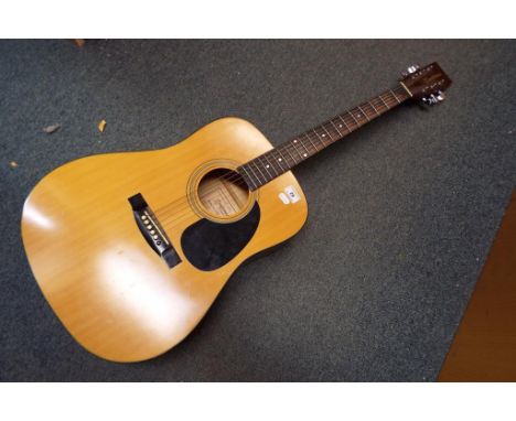 A 6 string Tanglewood acoustic guitar Model No. TW28SN