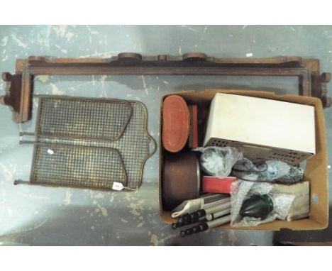 A mixed lot to include a quantity of clocks, cased binoculars, vintage Ekco radio, camera tripod, fire screen and similar. (3