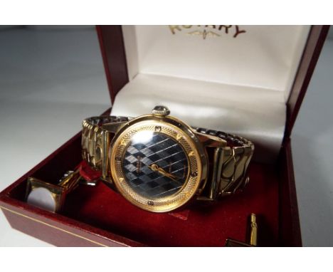 An Ardath 17 jewel Interbloc wristwatch with elasticated strap, Swiss made serial No. 10481B 3109, and a pair of plated gentl