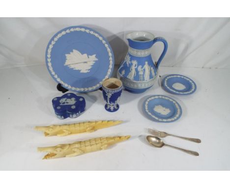 A mixed lot to include a quantity of Wedgwood Jasperware, a silver hallmarked fork and spoon Sheffield assay and two carved b