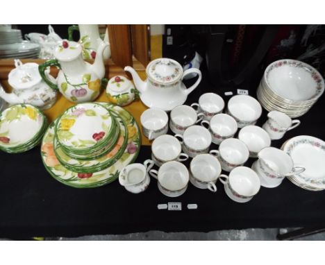 A part service Paragon Belinda pattern comprising 33 pieces to include teapot, bowls, plates, cups and similar, also included