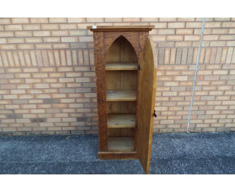 A good quality solid wooden cabinet with single door opening to reveal three shelves, three shelf bookcase with metal door fu