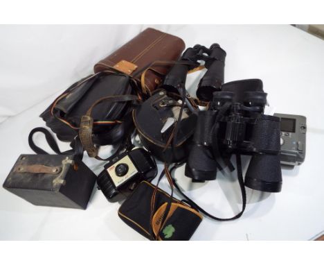 A good mixed box of photographic equipment, binoculars to include a pair of Telstar 35 x 60 in protective case, a Miranda 10 