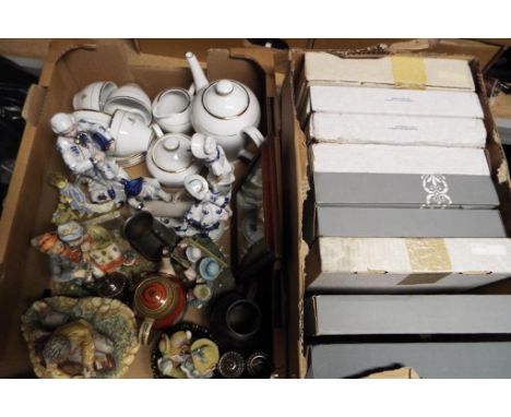 A box containing a quantity of ceramic figurines, pewter ware, Royal commemorative teapot, sugar bowl, creamer, cups and sauc