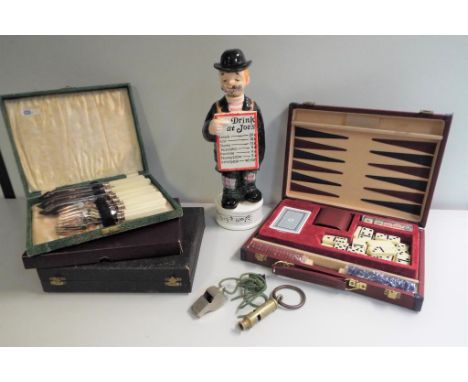 A vintage musical decanter 'Drink at Joes', 34 cm (high) (working mechanical mechanism - this does not constitute a guarantee