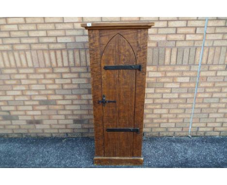 A good quality solid wooden cabinet with single door opening to reveal three shelves, three shelf bookcase with metal door fu