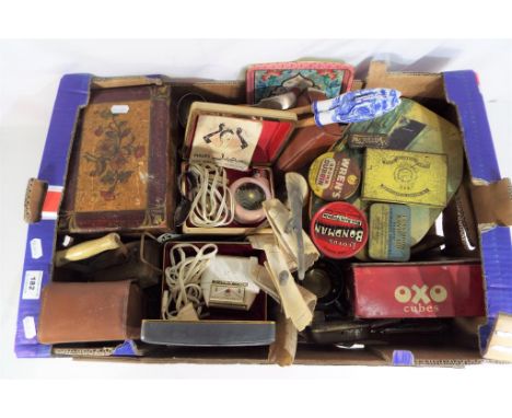 A good mix lot to include vintage tins, vintage Phillips Lady Shave and Remington Roll- A-Matic, plated ware and other. 