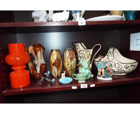A good mixed lot of ceramics to include a Wade water jug and ceramic basket decorated in the Gothic pattern further Wade cera
