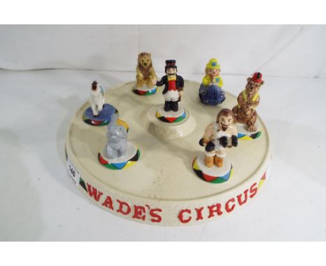 Wade - ceramic Wade Circus Platform with seven figures to include Ring Master, Lion, Elephant, Clown, Strong Man and similar.