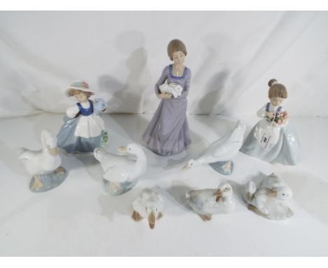 Nao - a quantity of Nao ceramic figurines to include swans and lady figurines (9)