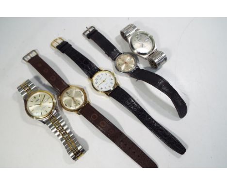 Five gentlemen's wristwatches to include two Lorus both with stainless steel strap, an Animiste with black leather strap, two
