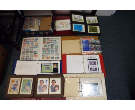 Philately - Nine binders containing a quantity of mint stamps, first day covers, PHQ cards, also included is a small vintage 