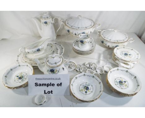 An Argyle dinner service with floral and gilt decoration comprising plates, cups, saucers, serving dishes and similar