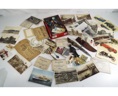 A Parts Vintage Tin containing a quantity of pocket and pen knives, small quantity of vintage marbles, Robertson's advertisin