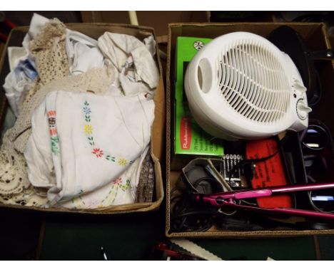 Two boxes containing a mixed lot to include a quantity of vintage linen, two pairs of binoculars in carry cases and other (2)