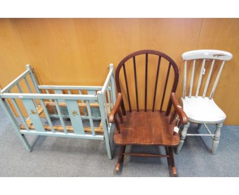 Lot to include a vintage doll's cot, two child's chairs, one a rocker. (3)