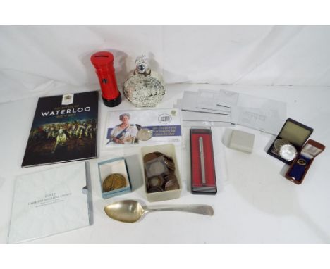 Lot to include a quantity of UK and foreign coins, commemorative coins, a PENTEL pen, sporting medal and a George III silver 