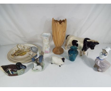 A good mixed lot of ceramics to include two Nao figurines, a Beswick ram, a signed Mdina glass vase, a Sylvac vase and other 