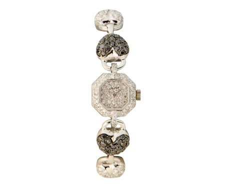 DeLaneau. An 18ct gold diamond and black diamond set manual wind bracelet watch Circa 2000 Manual wind Cal: 380 movement, oct