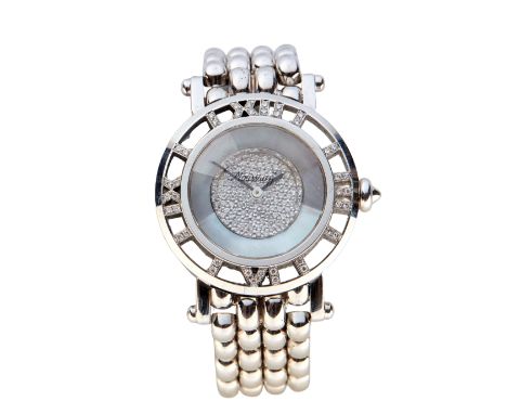 Swiss. A small size white gold diamond set bracelet watch Romus, Circa 1990 Quartz movement, mother of pearl dial with pavé d