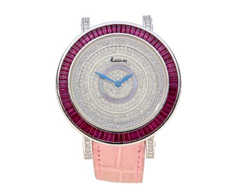 AMENDMENT: Please note that the bezel is set with synthetic rubies  Kutchinsky. A gold diamond and ruby set quartz wristwatch