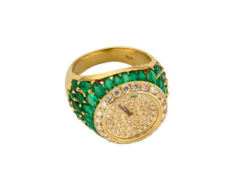 Swiss. An 18ct gold diamond and emerald set ring watch Quartz movement, pavé diamond dial with emerald at 12, brilliant cut d