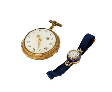 An early 20th century ladies diamond set blue enamelled cocktail watch wound through the bezel  Circa 1900 Swiss cylinder mov