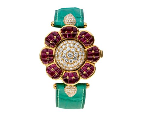 Swiss. A ruby and diamond set quartz wristwatch Quartz movement, champagne dial, facetted crystal, domed diamond set hinged s