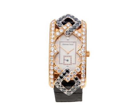 Audemars Piguet. An 18ct rose gold and diamond set manual wind wristwatch with custom case Numbered D74756 22 jewel manual wi