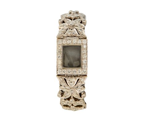 A diamond set watch bracelet  Central panel with crystal and round brilliant cut diamond bezel (case back and movement defici
