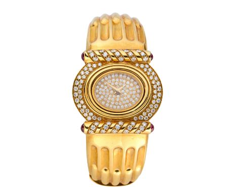Swiss. A gold diamond and ruby set quartz bangle watch Quartz movement, pavé diamond dial, oval case with diamond set bezel, 
