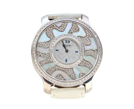 Kutchinsky. A silver diamond set quartz wristwatch Mystery, Circa 1990 Quartz movement, pavé diamond dial with mother of pear