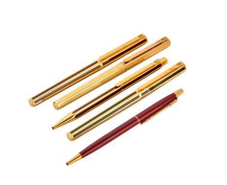 Caran D'Ache. A group of five pens Comprising three fountain pens with hexagonal barrels, one with engine turned decoration, 