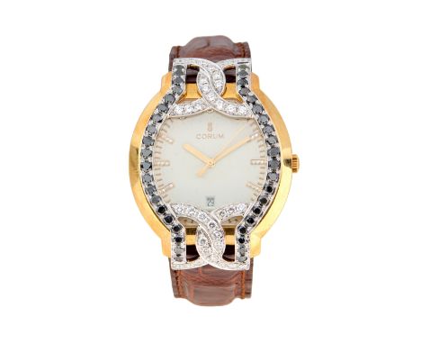 Corum. An 18ct gold and diamond set quartz wristwatch with custom case Numbered 57234B/90.253.58 Jewelled quartz movement num
