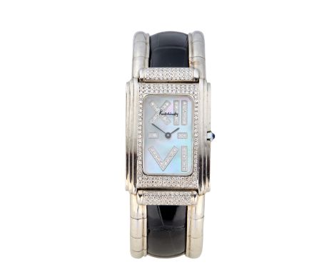 Kutchinsky. An 18ct white gold and diamond set bangle watch  Venezia, Circa 1990 Quartz movement, rectangular shaped mother o