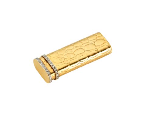 A gold and diamond set lighter Animal skin patterning to the case and two brilliant cut diamond set bands to the cover 7.1cm 