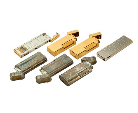 A lot of five Dunhill lighters Comprising two gold plated lighters of rectangular form with engine turned decoration, signed 