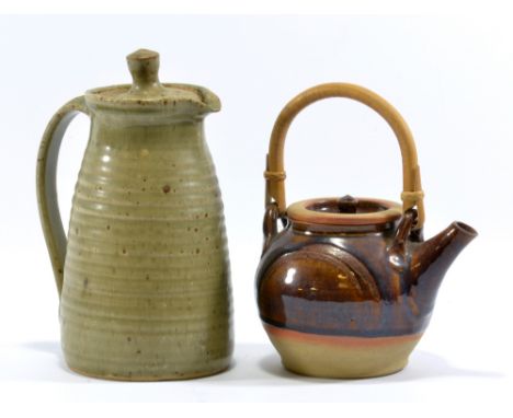 YELLAND POTTERY; a stoneware coffee pot covered in green ash glaze, height 22cm; together with a small Winchcombe style teapo