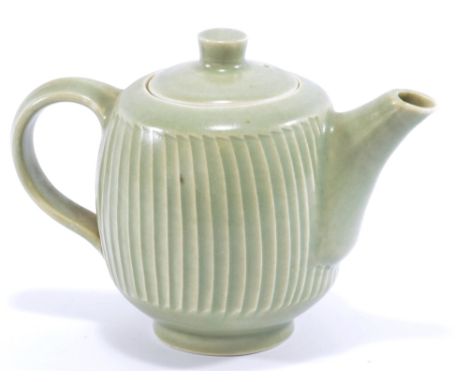 DAVID LEACH (1911-2005) for Lowerdown Pottery; a fluted porcelain teapot covered in celadon glaze, impressed DL mark, height 