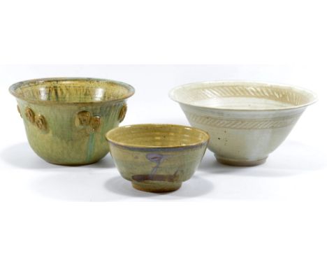 A group of stoneware bowls, including a Leach Pottery Z bowl (af), various marks, largest diameter 22cm (3).   CONDITION REPO