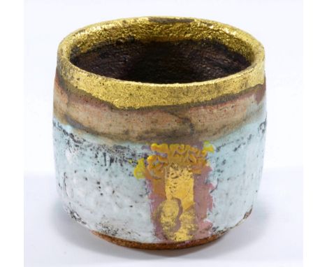 ROBIN WELCH (born 1936); a stoneware tea bowl, white glaze with gold rim and yellow enamel, impressed RW mark, height 9cm.   