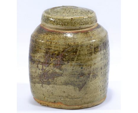 JIM MALONE (born 1946); a stoneware jar and cover, green ash glaze and incised decoration, impressed JM mark, height 15cm. (D