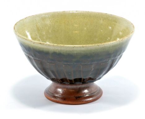 RICHARD BATTERHAM (born 1936); a stoneware footed and fluted bowl, tenmoku and green ash glaze, diameter 18cm. (D)   CONDITIO