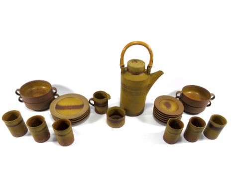 ROBIN WELCH (born 1936); a coffee pot with cane handle, six cups, milk, sugar, four plates, six side plates, four twin handle