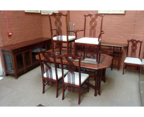 GIORGETTI;  a contemporary dining room suite, comprising shaped rectangular dining table with bevelled inset glass top and ra