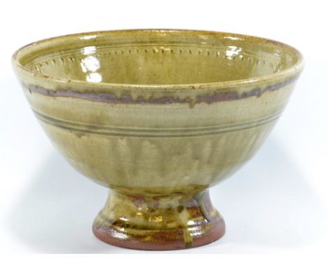 RICHARD BATTERHAM (born 1936); a large stoneware pedestal bowl covered in green ash glaze, diameter 28cm. (D)   CONDITION REP